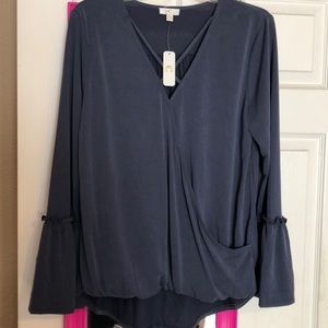 Charming Charlie blue long sleeve crisscross top